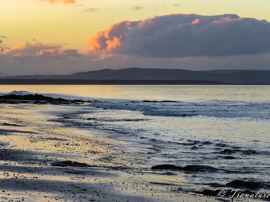 sunset over Moray Firth looking West on an outgoing tide